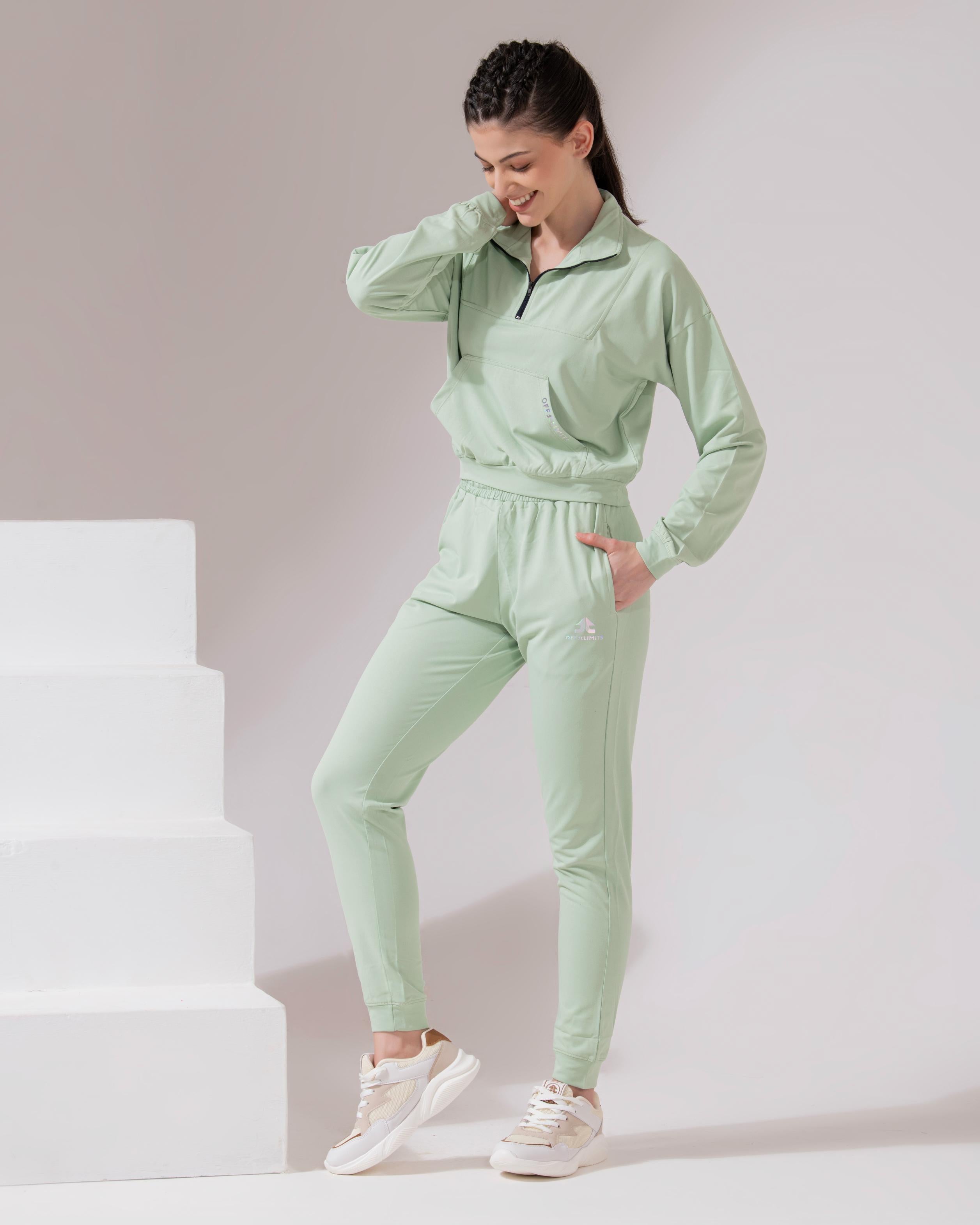 WMN PSL 1/2 ZIP CROP TS