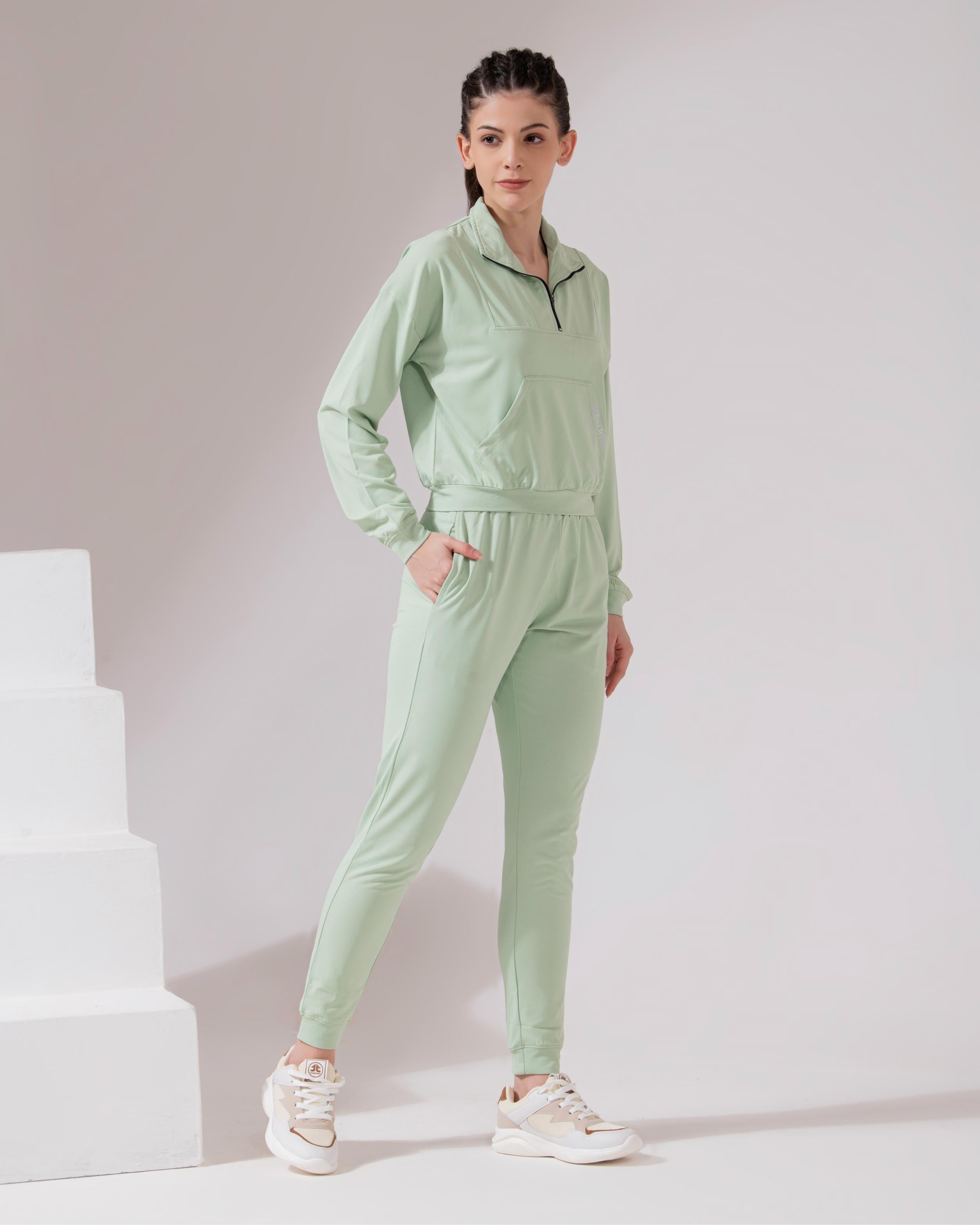 WMN PSL 1/2 ZIP CROP TS